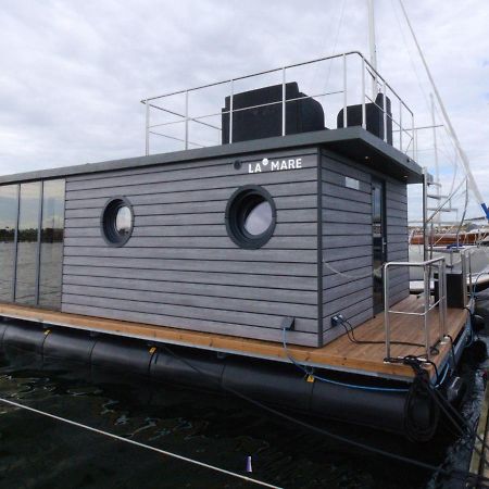 Hausboot Fjord Lacerta Mit Dachterrasse In Wendtorf Exterior foto